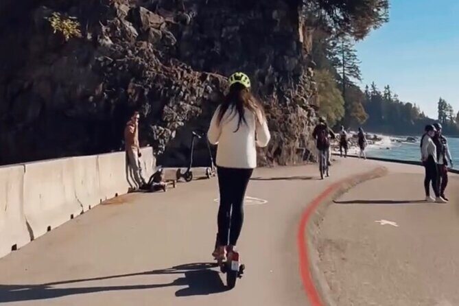 Explore Stanley Park on Electric Scooters - Brockton Point Lighthouse and Totem Poles: Your First Vancouver Icon