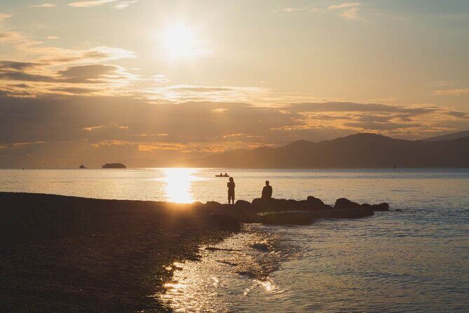 Explore Vancouver: Beaches & Downtown Audio Tour Bundle - Stop 1: Sunset Beach for an easy warm-up