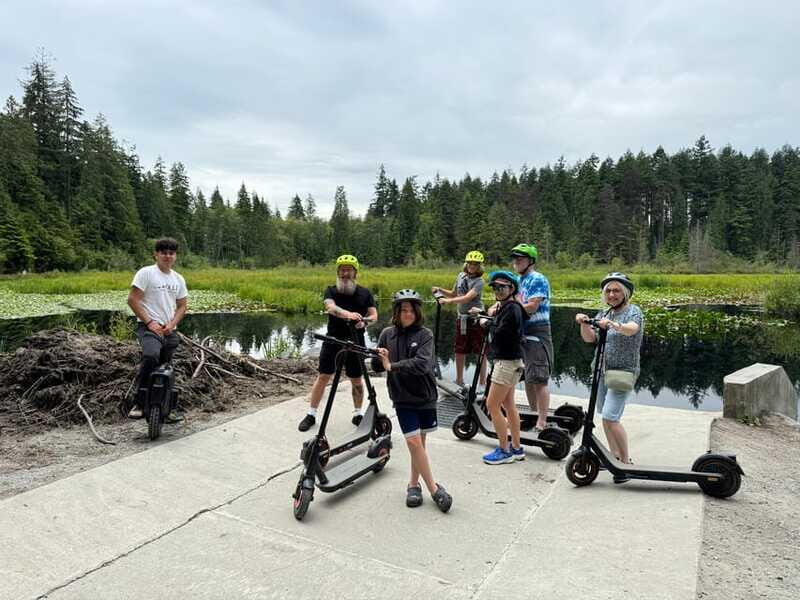 Stanley Park EUC & E-scooters loop tour - Beaver Lake photo stop: the ride pauses without losing momentum