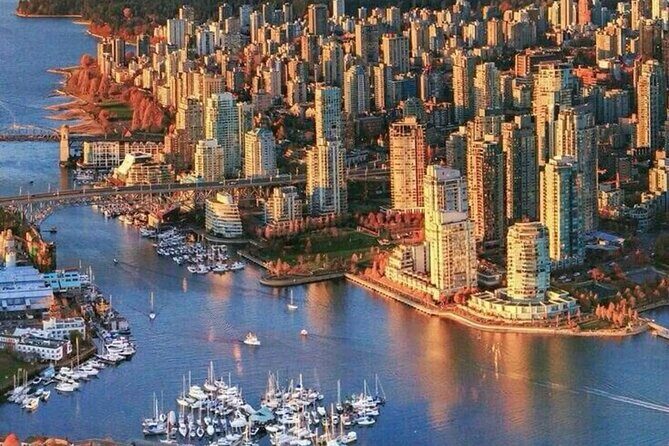 Vancouver City Tour to Experience Sea Sky and Land- private tour - English Bay: Seawall Energy and the Inukshuk Marker