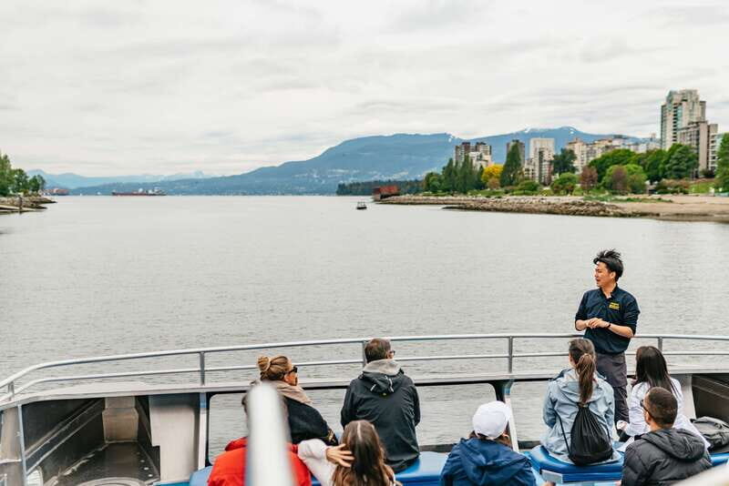 Vancouver: Covered Whale Watching Adventure with Free Photos - The Boat Experience: Heated Cabin, Multiple Deck Views, Real Photography Angles