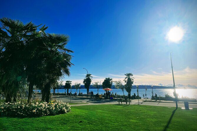 Vancouver Half Day City Tour Private - English Bay beach breaks and the little sculpture stops