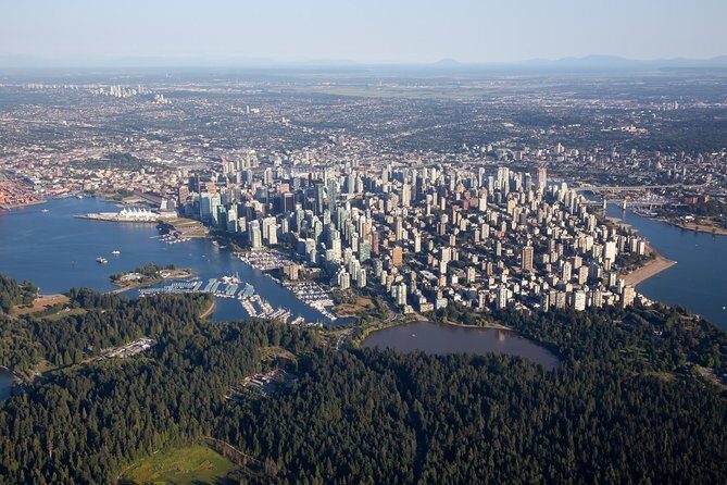 Vancouver Premium Tour: Capilano Bridge + Grouse Mountain Lunch - Stanley Park: Totem Poles, Prospect Point, and a rainforest feel