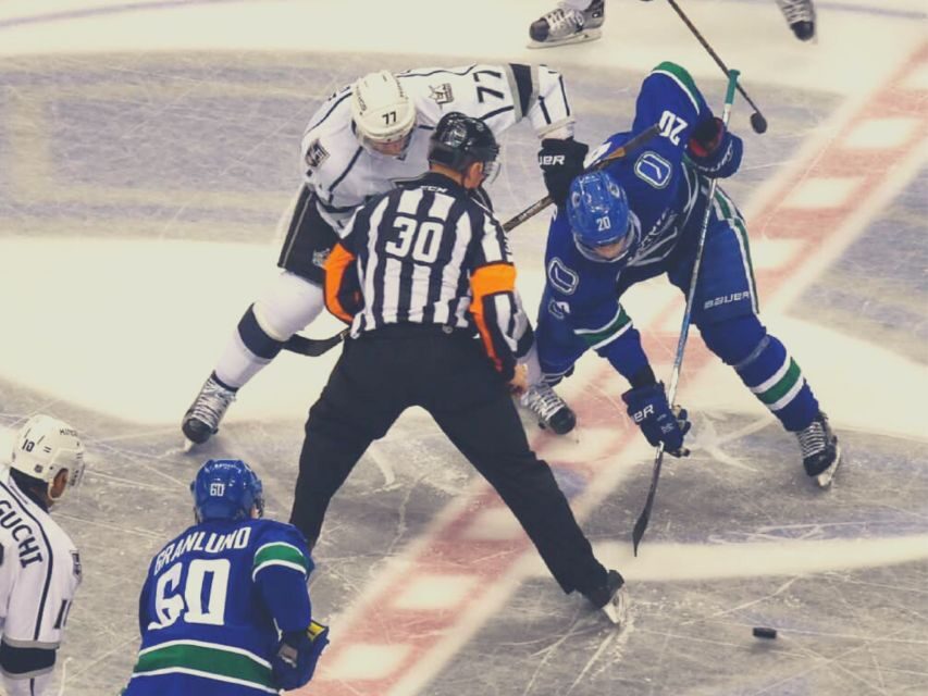 Vancouver: Vancouver Canucks Ice Hockey Game Ticket - Rogers Arena: hockey with waterfront and mountain views