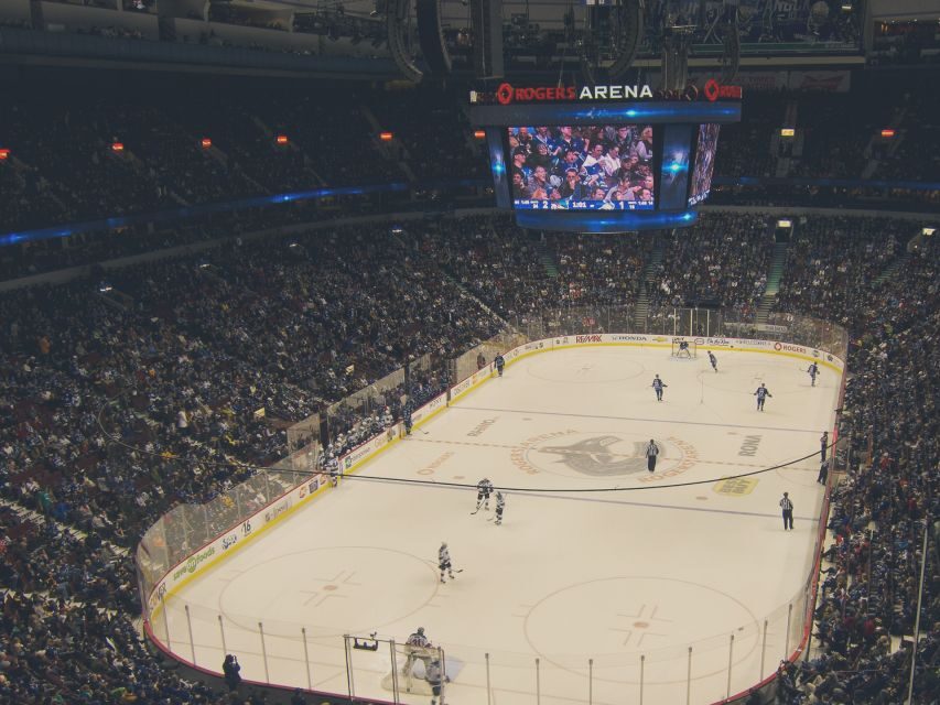 Vancouver: Vancouver Canucks Ice Hockey Game Ticket - The Canucks vibe: crowd energy and wearing the team colors